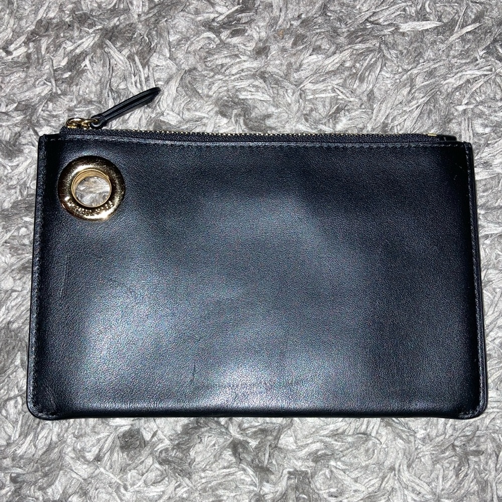 Michael kors logo and leather wristlet bag pouch medium are of trio set
